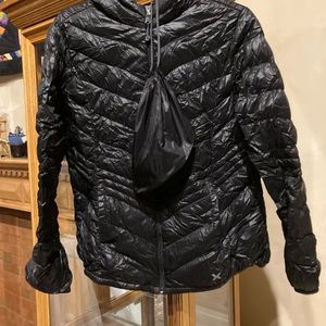 Packable down jacket.  Light and warm without weight.